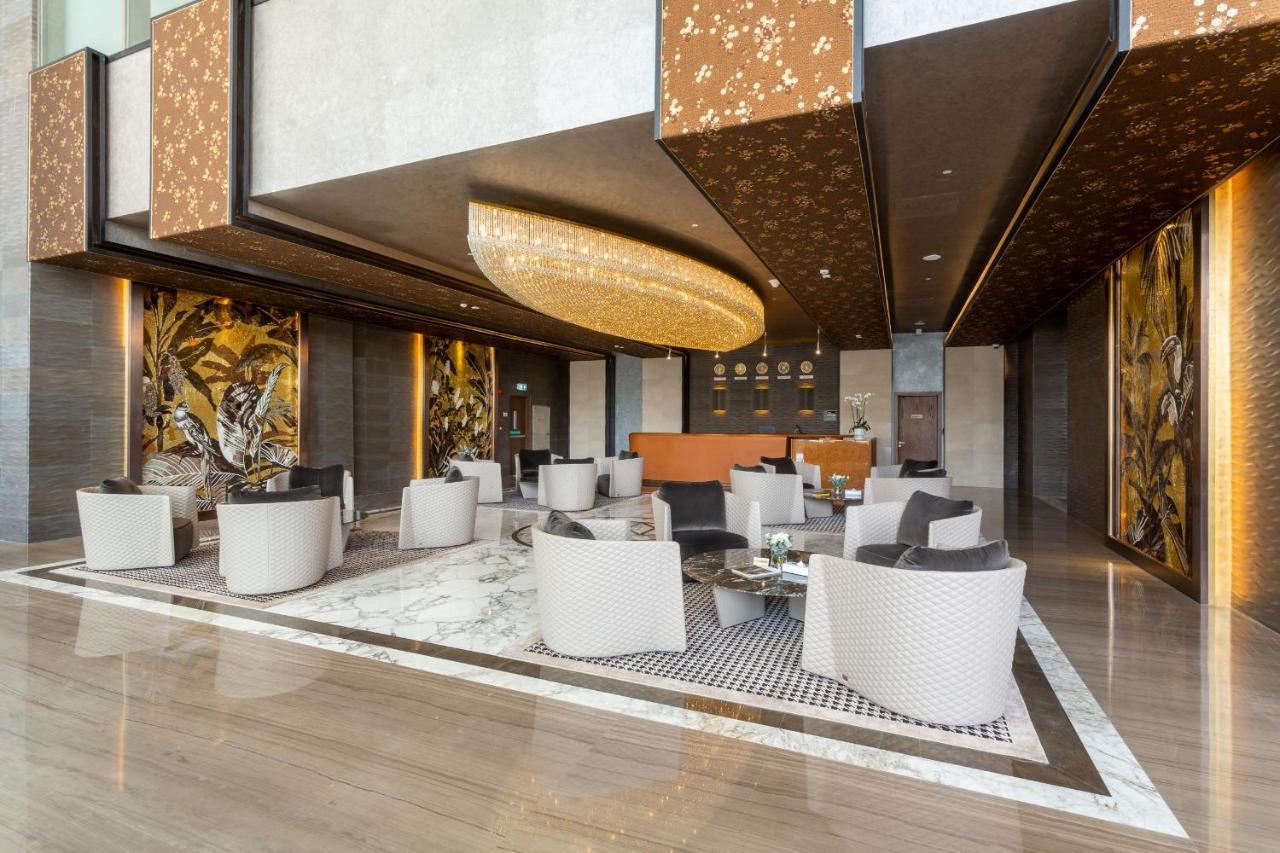 The Bentley Luxury Hotel & Suites Доха Экстерьер фото The lobby of the hotel