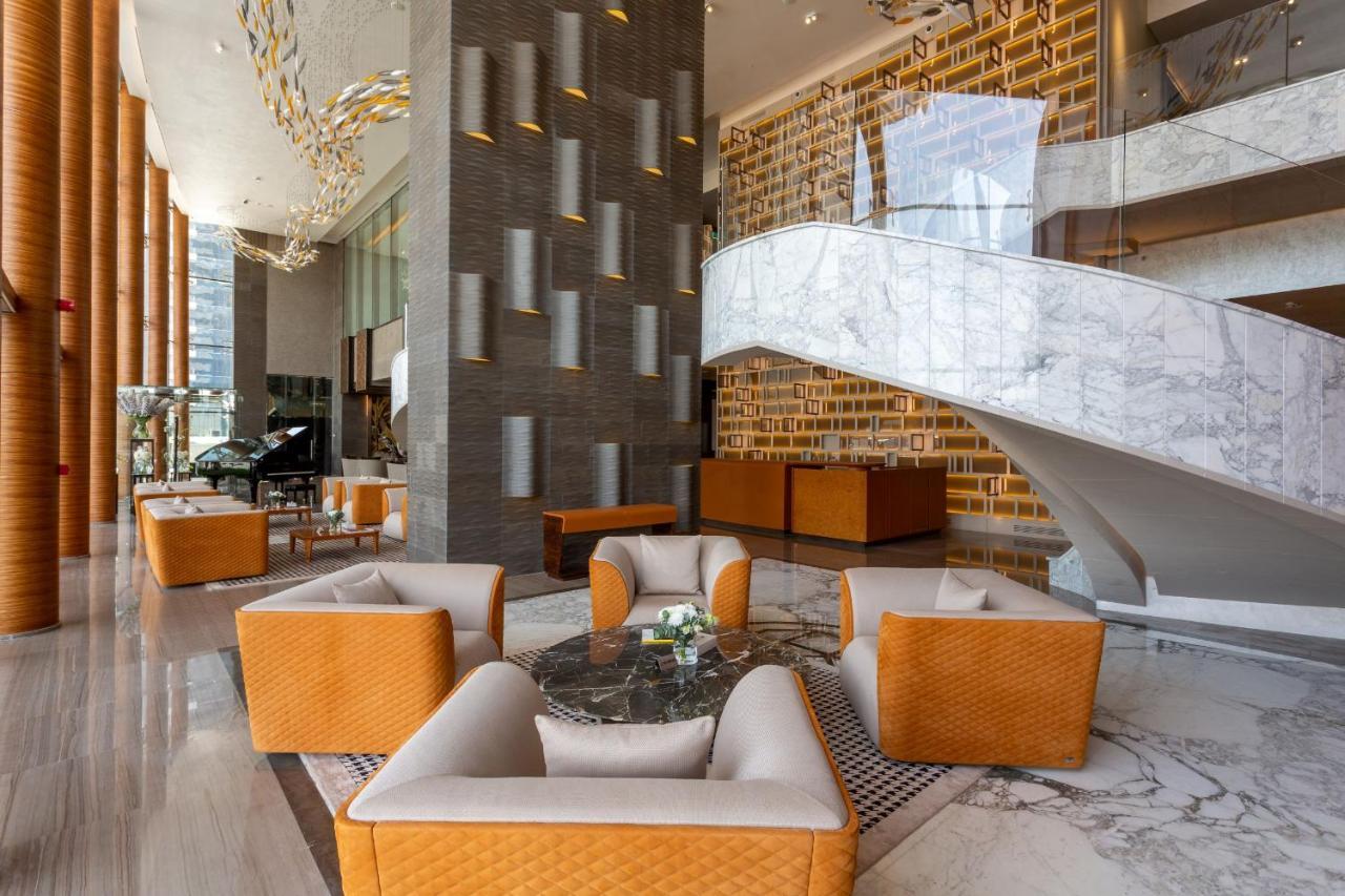 The Bentley Luxury Hotel & Suites Доха Экстерьер фото The lobby of the hotel