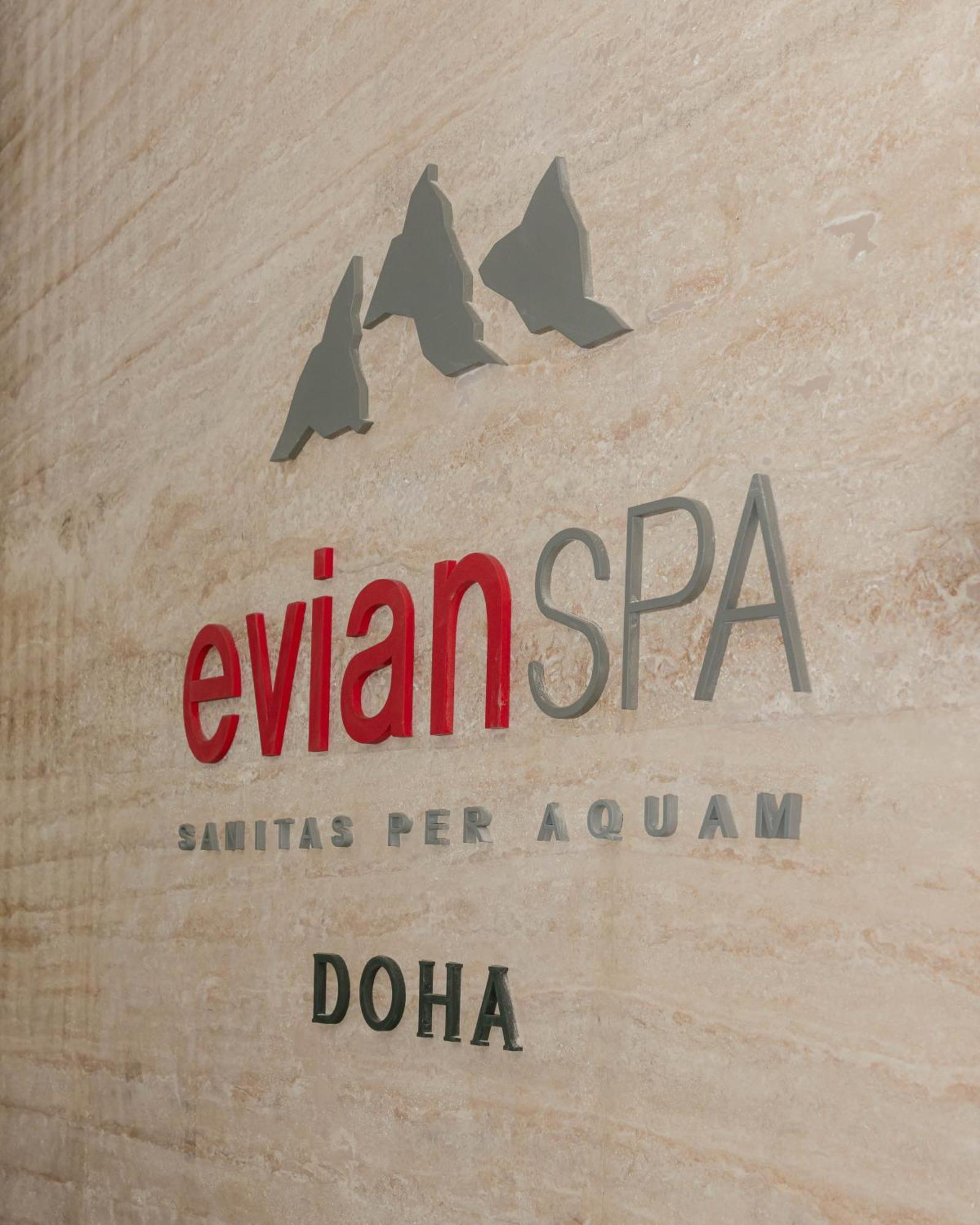 The Bentley Luxury Hotel & Suites Доха Экстерьер фото Evian Spa logo